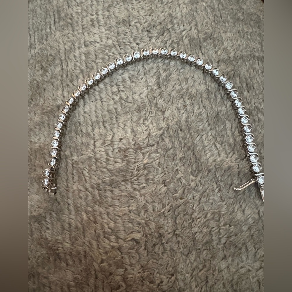 GUC stamped .925 silver cz tennis bracelet